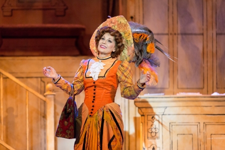 “If you want your sister courted, brother wed or cheese imported, just leave everything to me!” Valerie Perri Is that woman who arranges things—“Dolly Levi” in 3-D Theatricals’ “Hello Dolly!”